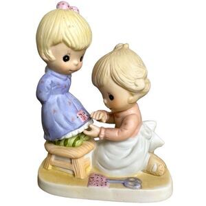 Vintage Russ Jennifer Alexander’s “A Stitch in Time,” collectible